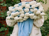 Hand-Crocheted Rose Round Blanket A versatile romantic gift that brightens everyday warmth. V1232-MGHT011