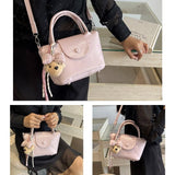 Pink Compact PU Leather Crossbody Bag With a pendant- Lightweight Handheld Shoulder Purse with V888-ELOSUNG56245-4