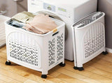 A wheeled foldable plastic laundry basket, suitable for dirty clothesnd easy to move. It features V1106-XYL001
