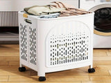 A wheeled foldable plastic laundry basket, suitable for dirty clothesnd easy to move. It features V1106-XYL001